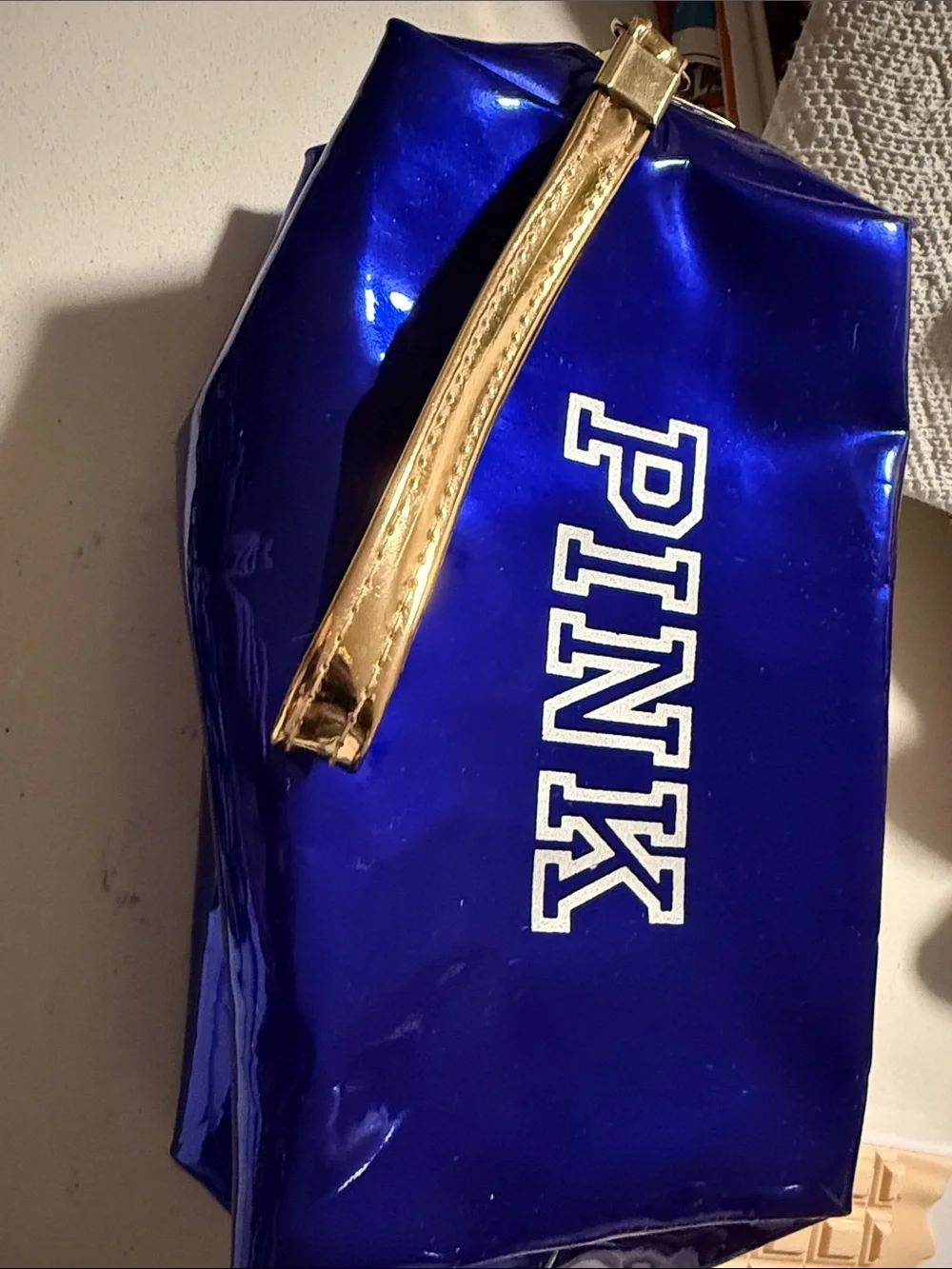 PINK Victoria's Secret Shiny Royal Blue Wristlet with Gold Strap. Dorm essential